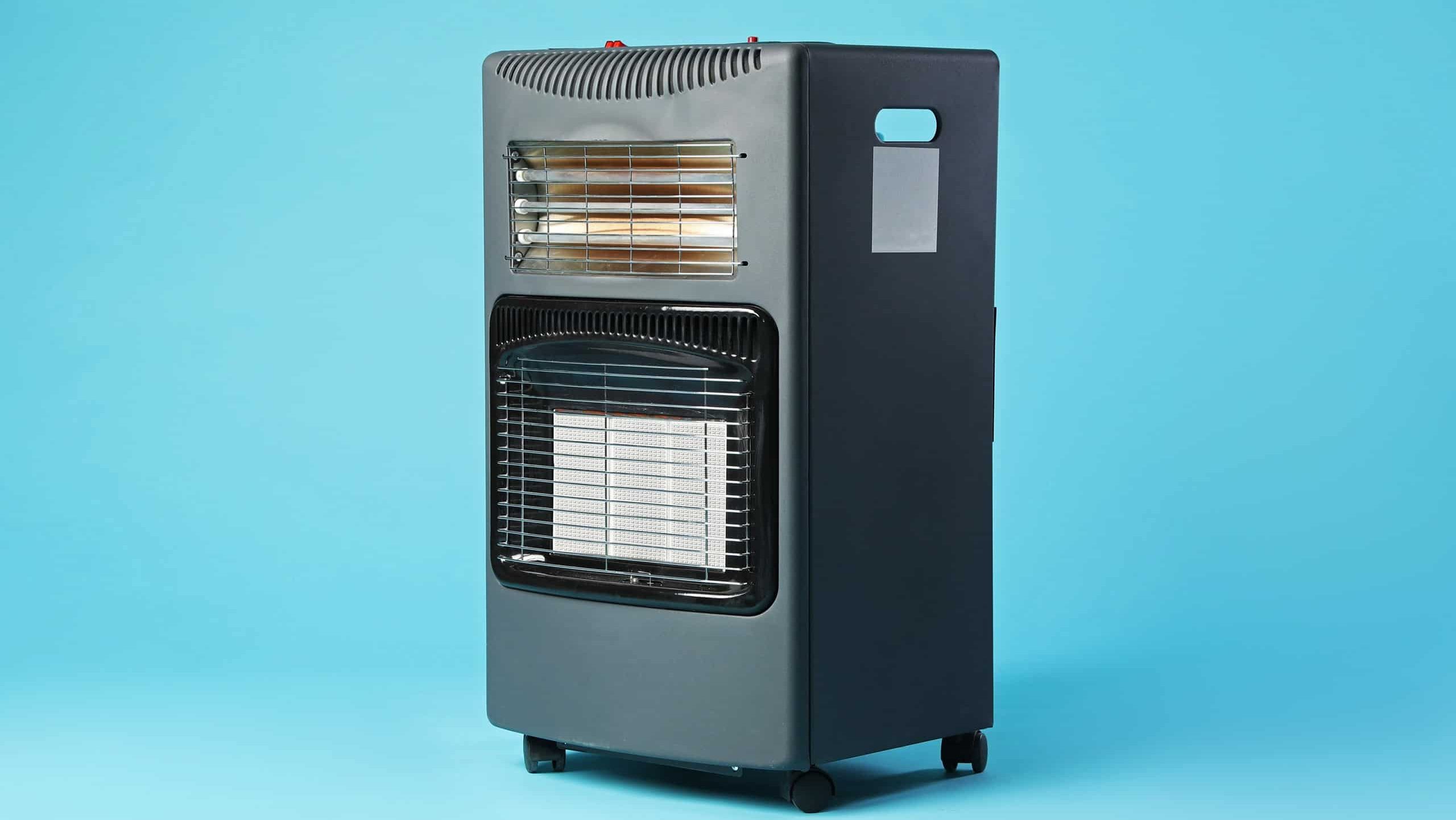 One electric heater on light blue background