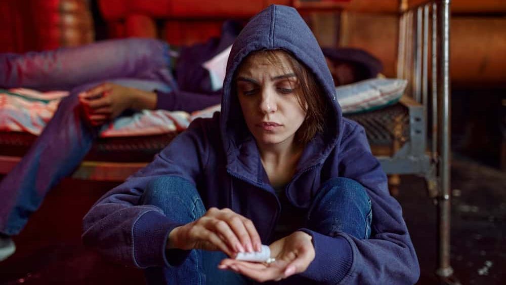 Drug addicts took a dose of pills in den