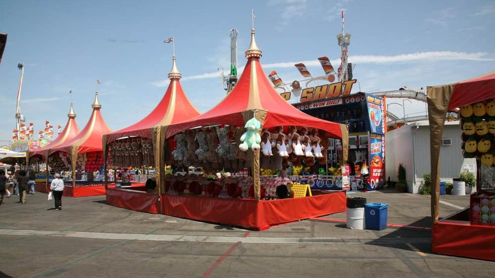 Costa Mesa, California - USA - August 8, 2024: OC Fair. Orange County Fair. Carnival Rides and Games. People of all ages love various Games and Rides while at the OC FAIR. The Fair is filled with Fun.