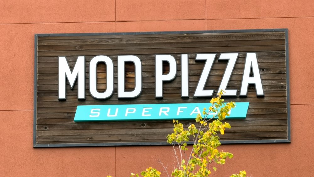 Los Angeles, CA - November 6, 2025: MOD Pizza Restaurant Exterior Sign on Building Wall.