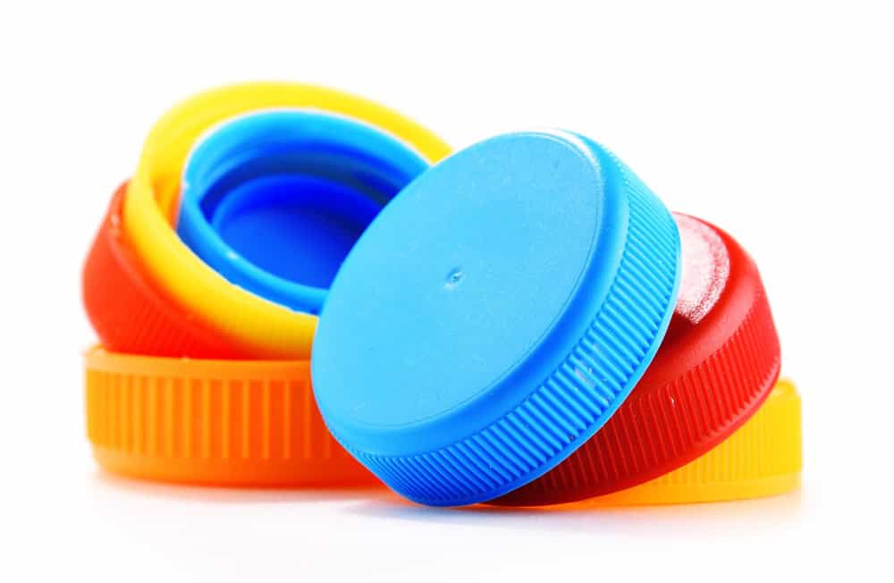 Plastic bottle caps isolated on white background.
