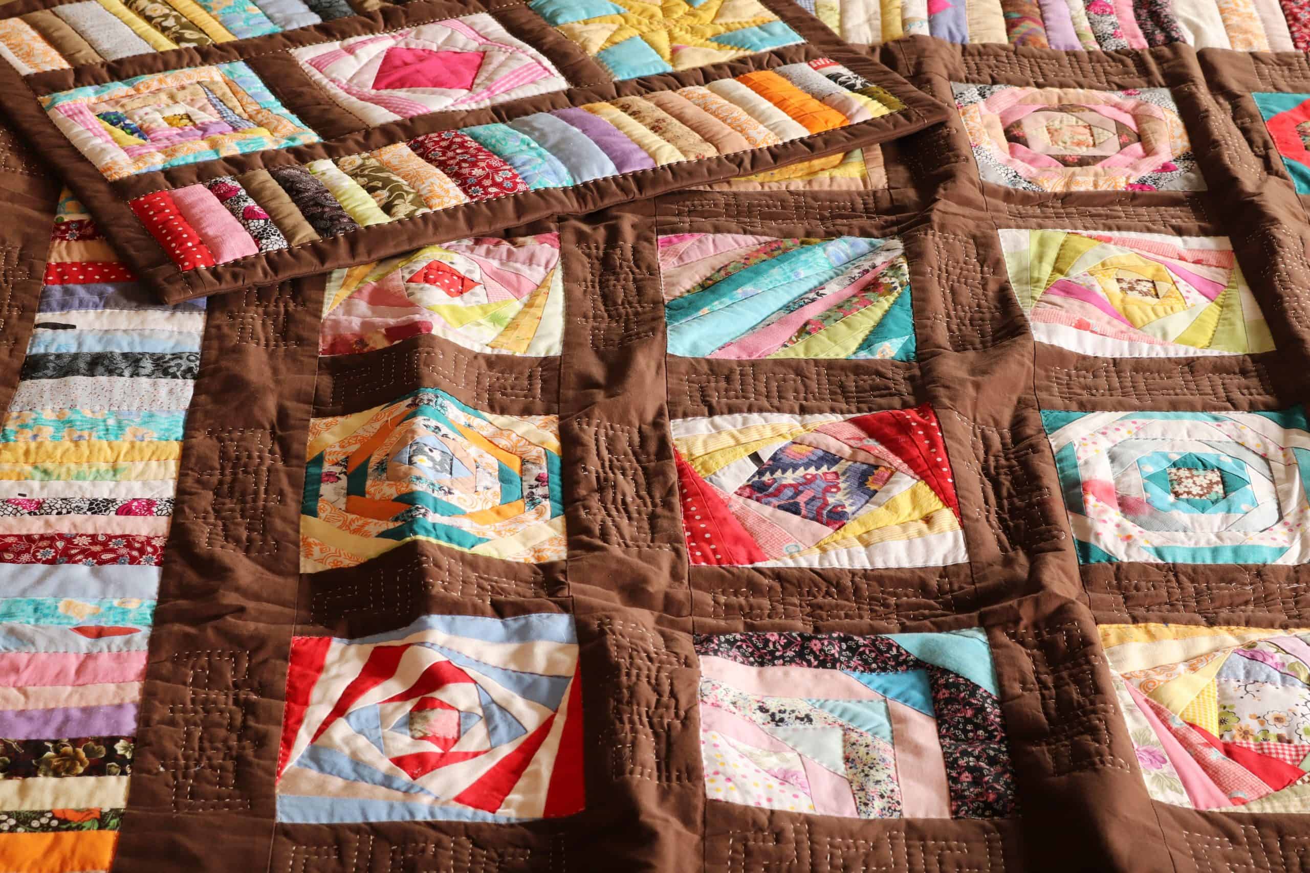 A quilt made using the patchwork technique.