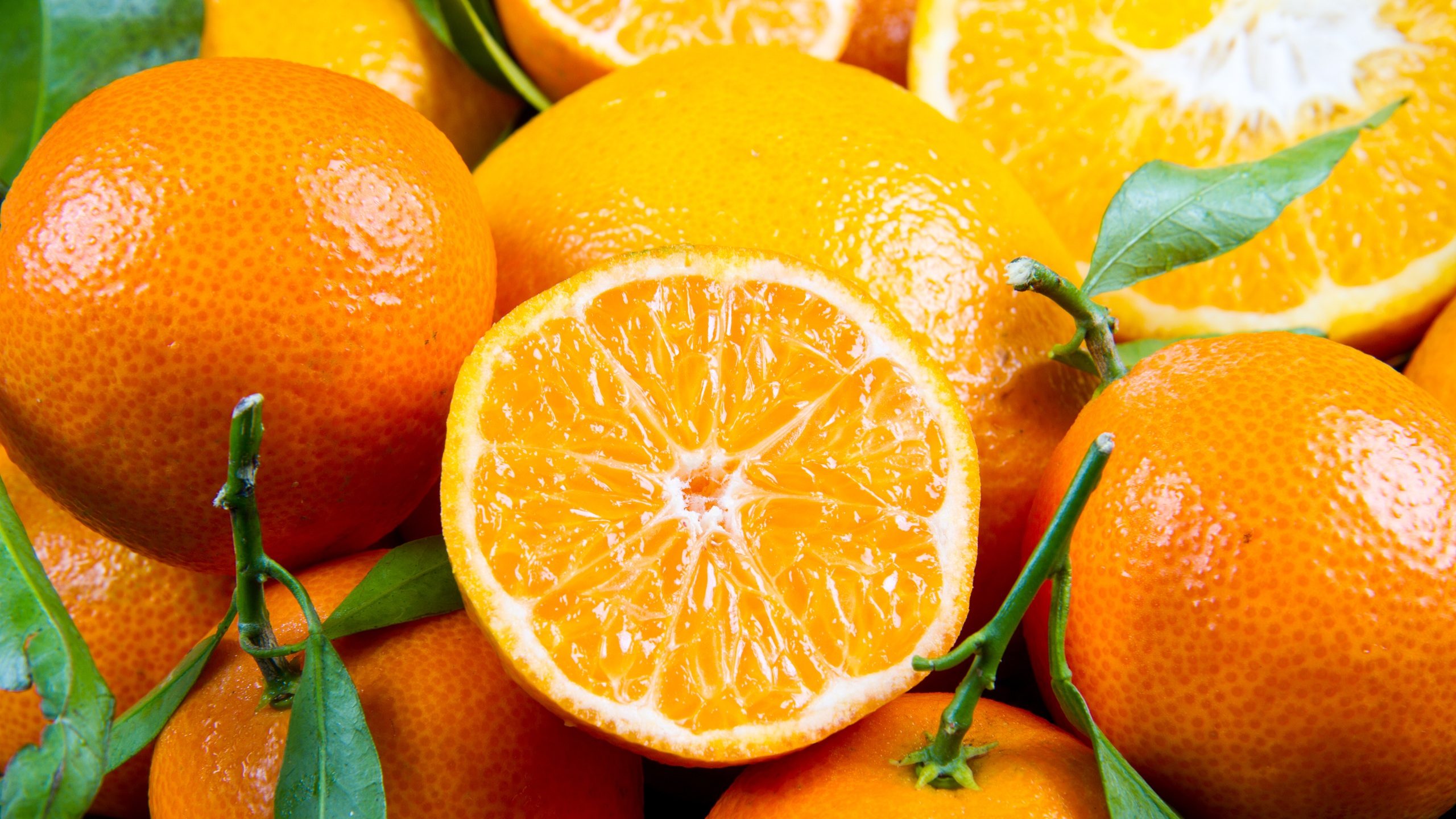 Background bunch of fresh tangerines oranges