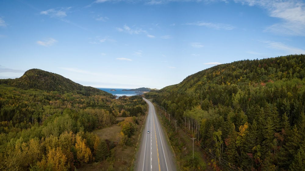Aerial panoramic landscape view of Bic National Park during a vibrant sunny day. Taken in Le Bic, Rimousky, Quebec, Canada.