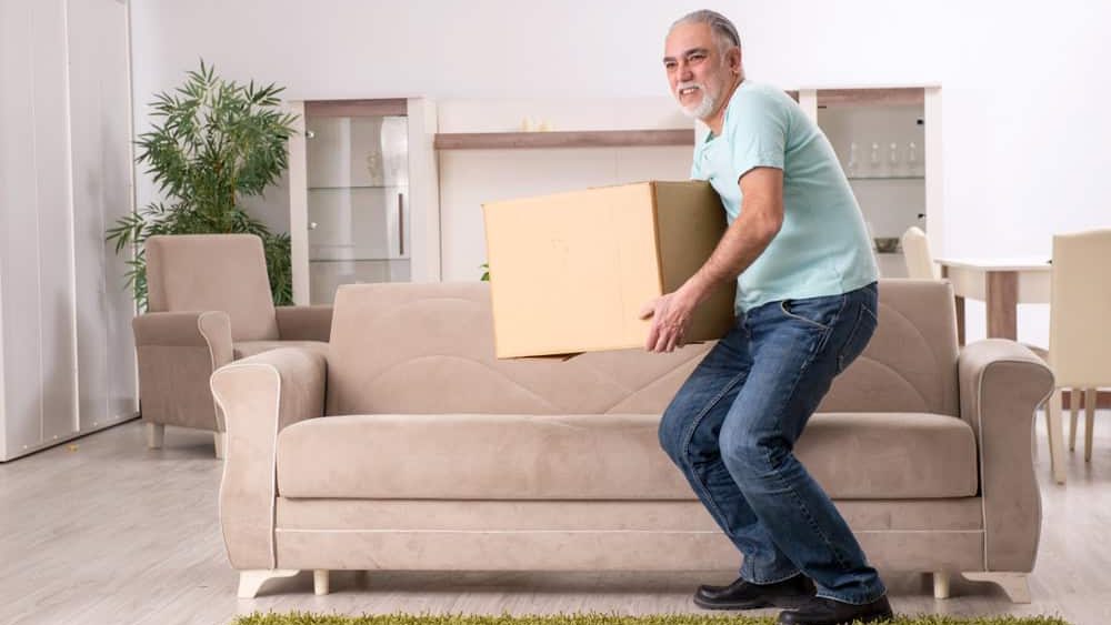White bearded old man suffering at home