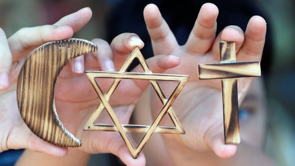 Christianity, Islam, Judaism, the three monotheistic religions with symbols of Jewish Star, Muslim Crescent and Christian Cross, Vietnam, Indochina, Southeast Asia, Asia