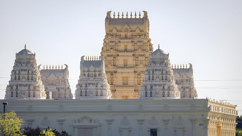 A scenic exterior view of the Purva Tirupati Sri Balaji Temple in Guwahati, India.