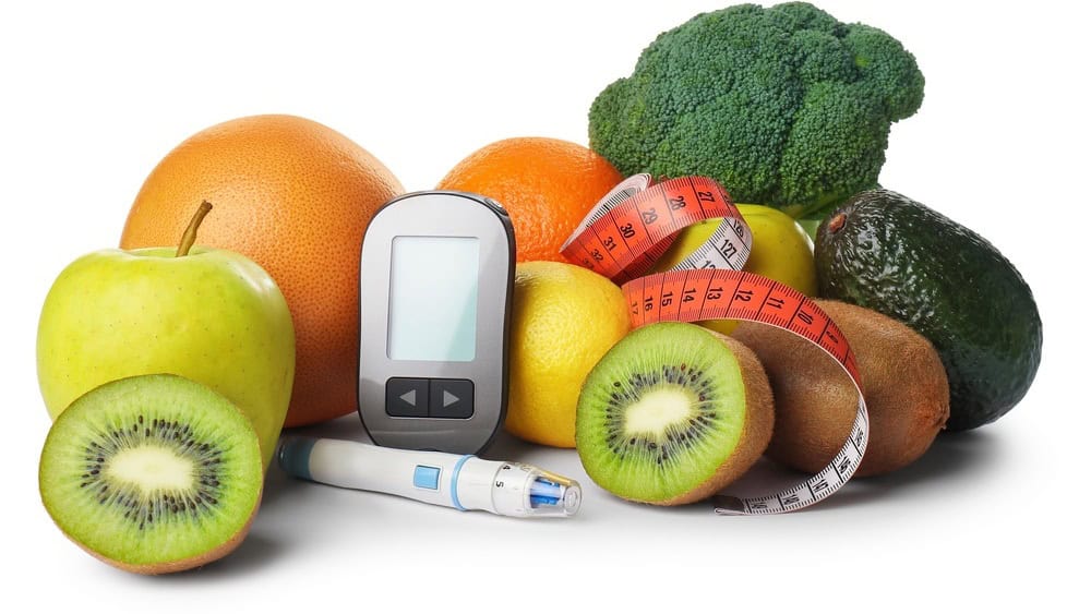 Diabetes control. Fresh products, digital glucometer, lancet pen and measuring tape isolated on white