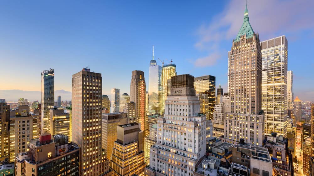 New York City Financial District cityscape at dusk.