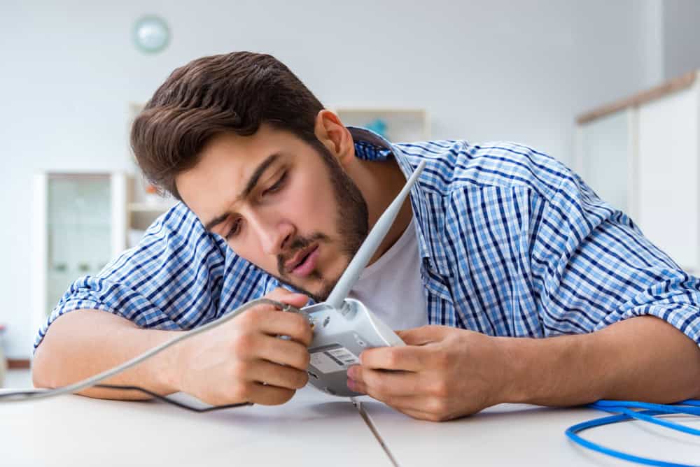 Frustrated young man due to weak internet reception