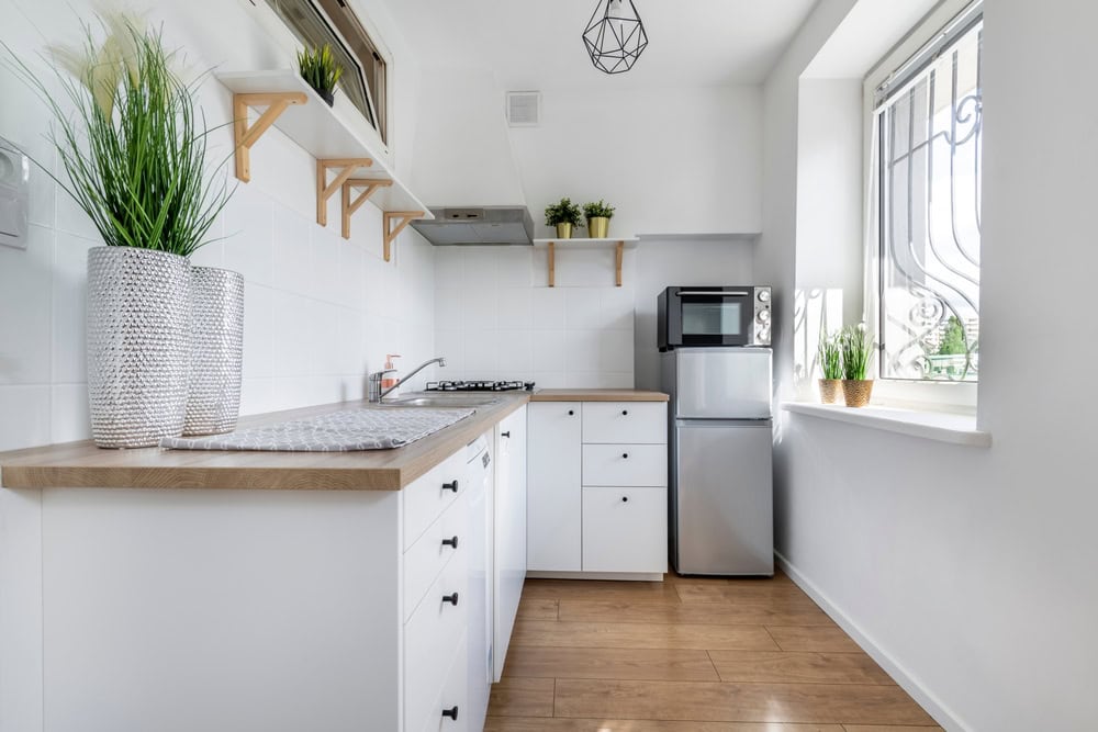 Small kitchen in white finishing - moder interior design
