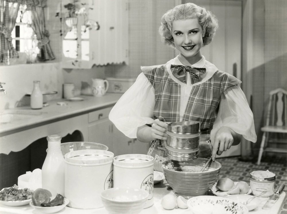 Domestic goddess baking in the kitchen