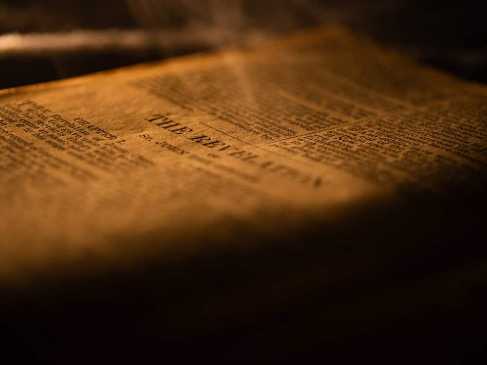 Bible book of revelations with smoke close up zoom shot selective focus Dewsbury West Yorkshire 5th January 2025