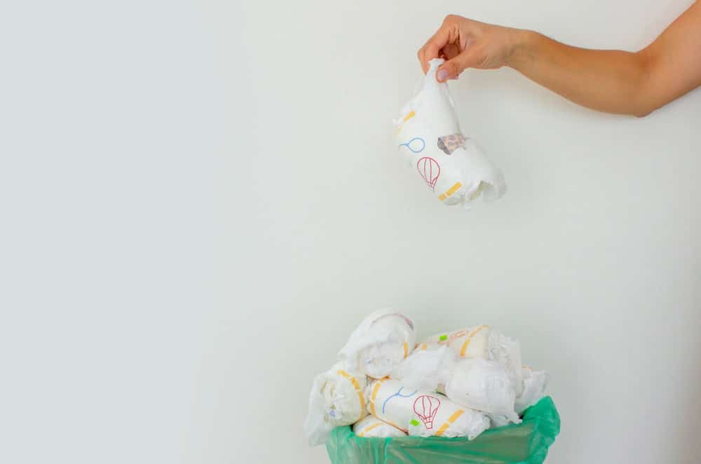 Diaper waste, dirty diapers. Disposal of used baby diapers